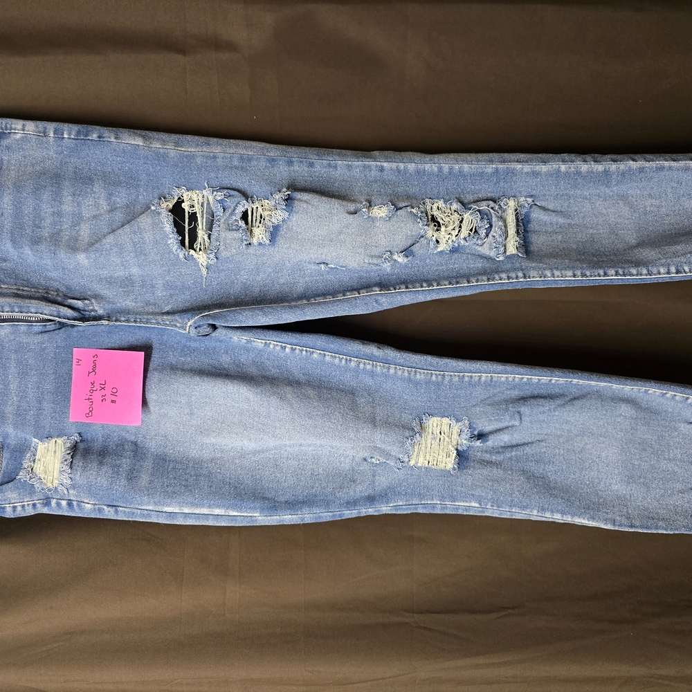 Blue Skinny Distressed Jeans with Ripped Design